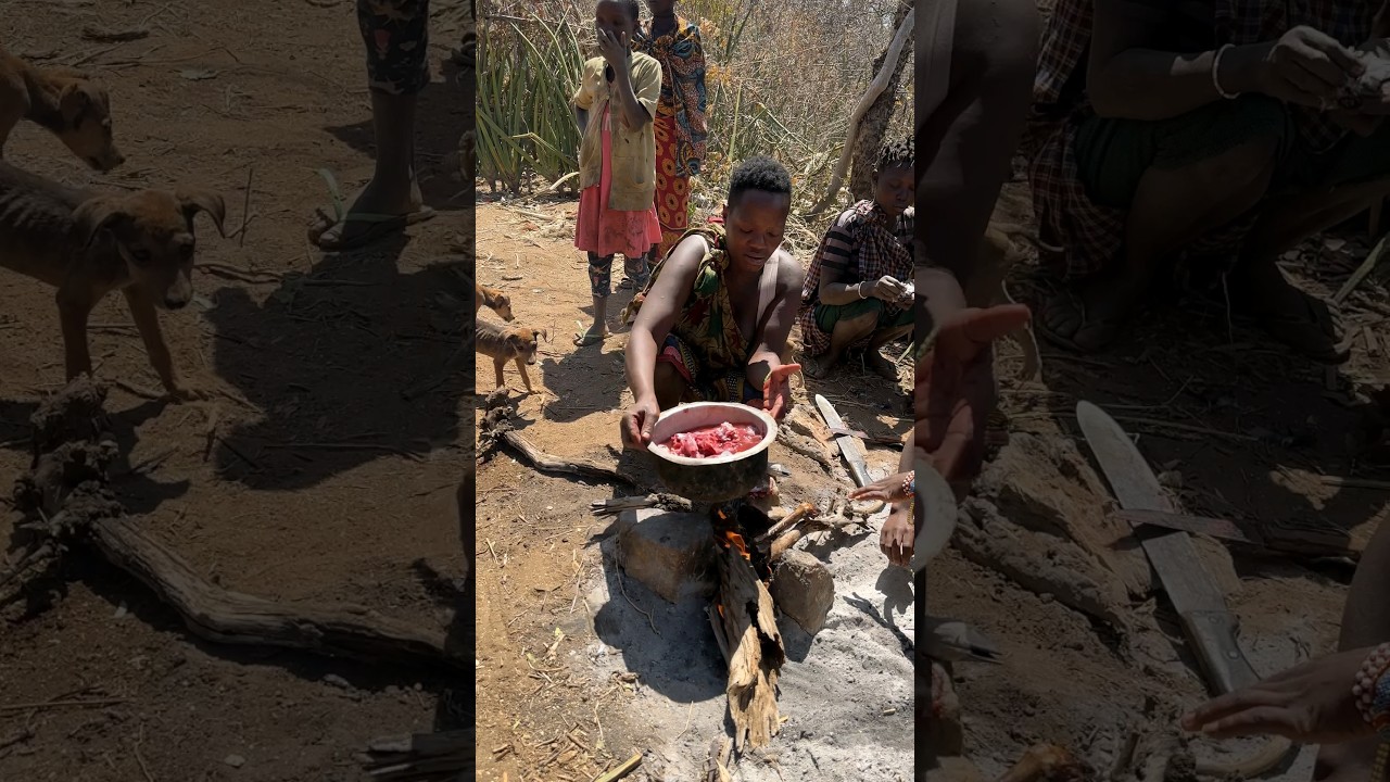 Hadza woman cooking in the WILDERNESS