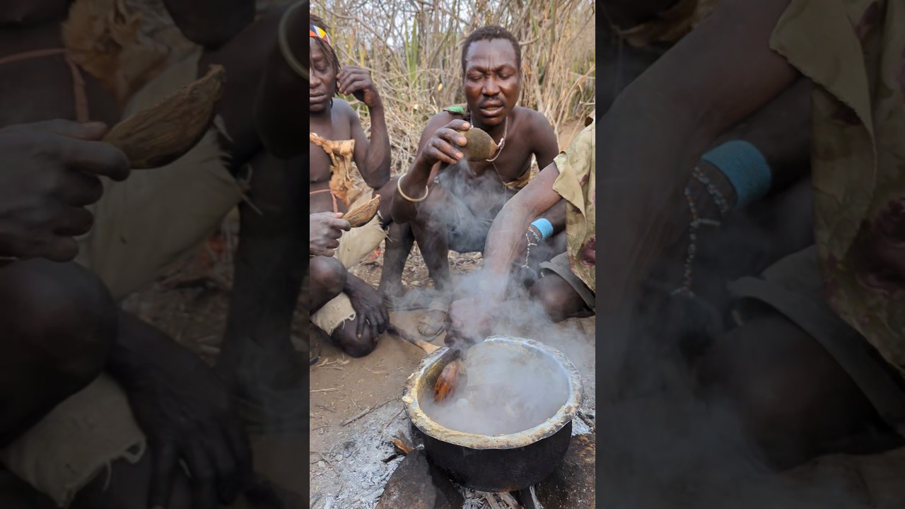 happy people who survives by hunting wild meat and roots for food #hadzabetribe