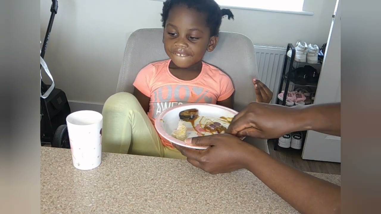 African child born in the Western world eating African food. watch to the end