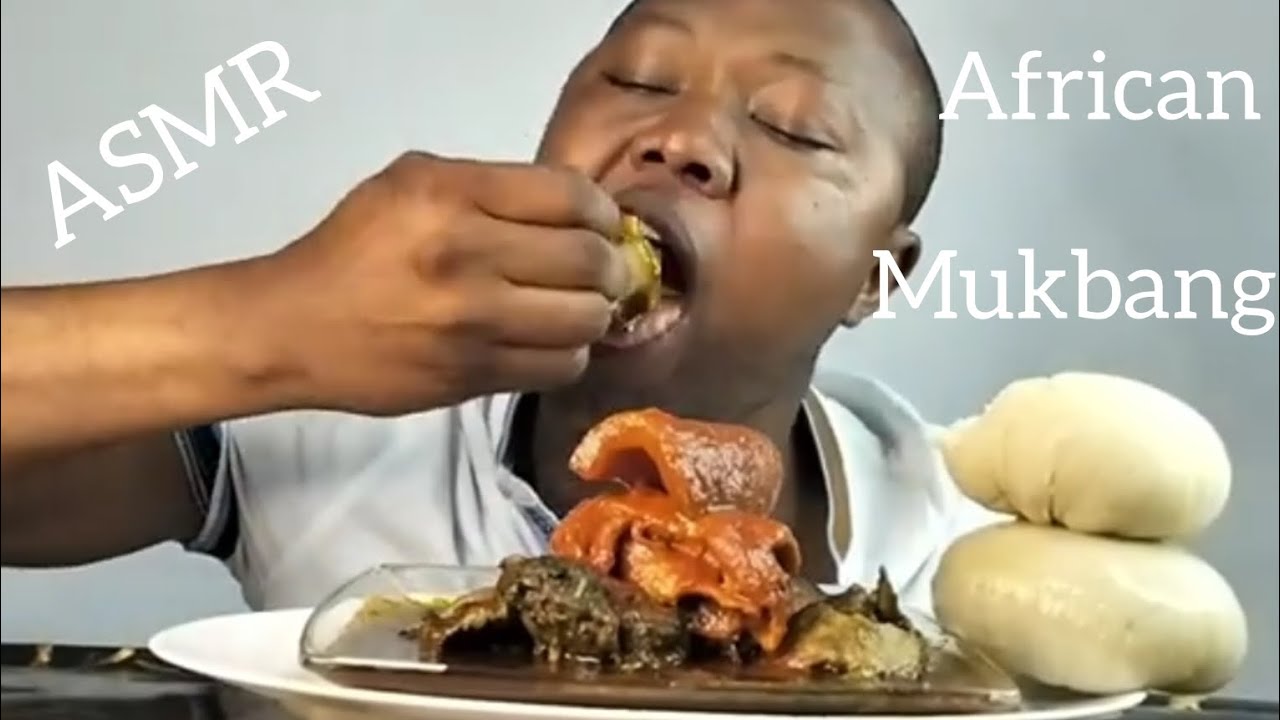 ASMR eating fufu with spicy chicken black soup mukbang African food