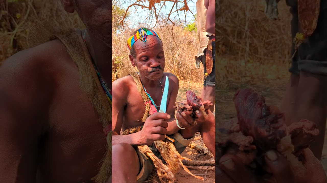 Savoring Tradition: A Hadza elder enjoying freshly hunted game