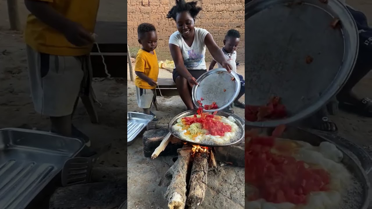 Beautiful african woman cooking