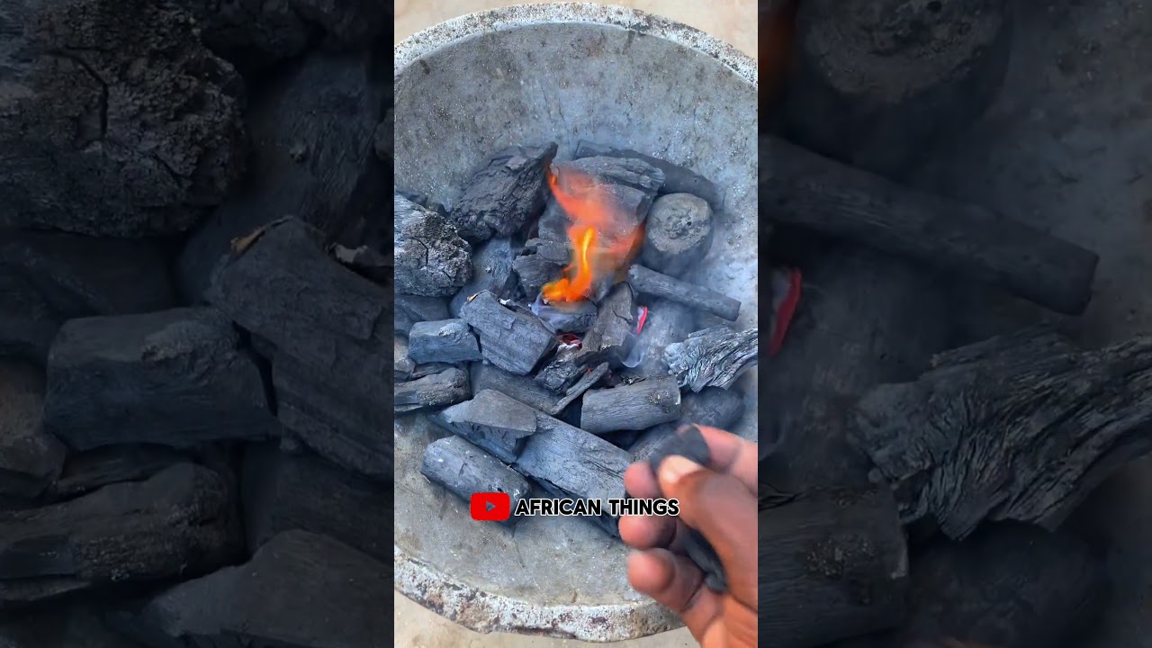 Lighting up the fire with charcoal in an African home 5 #Africa #Ghana #africancountry #shorts