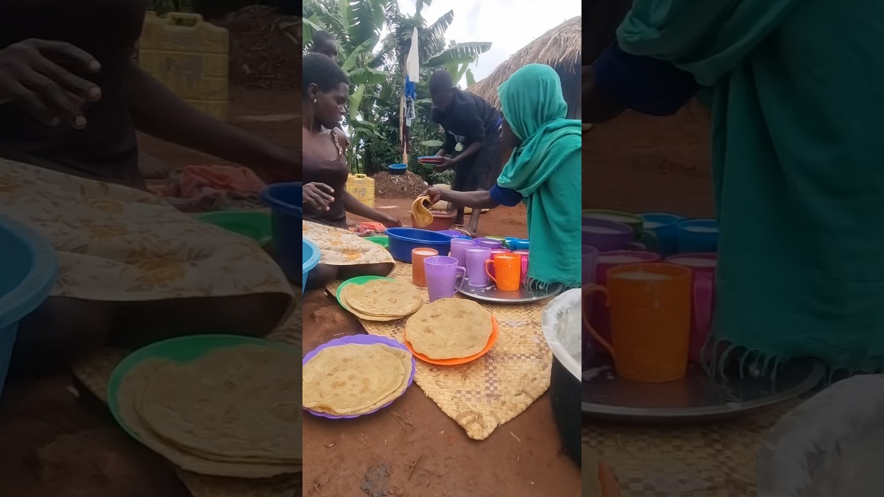 African mother is serving breakfast for her family #shortfeed #africa